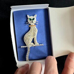 Vintage Avon 2006 Cat Crystal Pin with green rhinestones eyes and swinging tail